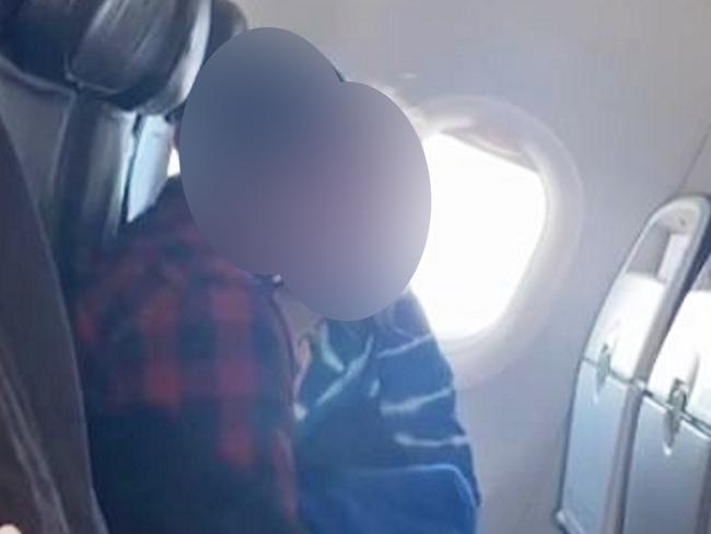 Video grab appearing to capture a woman pleasuring a male on a flight from London Heathrow to Dublin, May 7, 2024.  Holidaymakers were 
