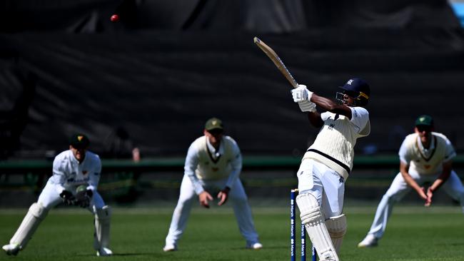 Ashley Chandrasinghe hits an elegant pull shot against Tasmania on Sheffield Shield debut for Victoria at Blundstone Arena. (Photo by Steve Bell/Getty Images)