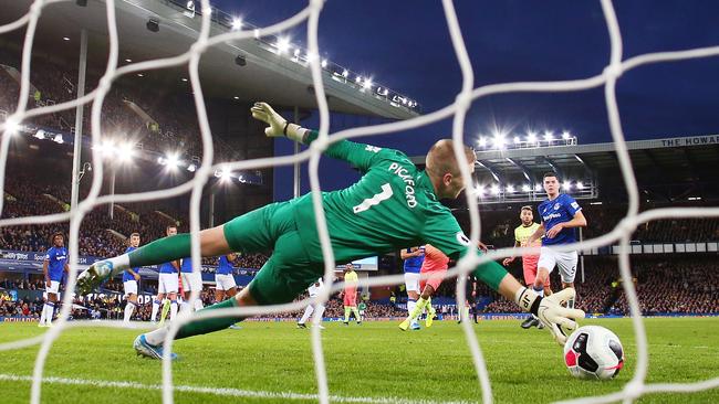Everton goalkeeper Jordan Pickford is beaten by a free-kick from Manchester City’s Riyad Mahrez at Goodison Park. Picture: Getty Images