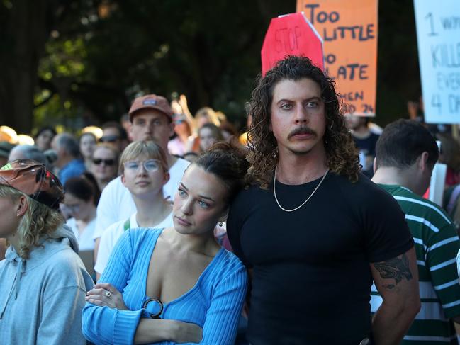 Abbie Chatfield and Adam Hyde join demonstrators during a national rally against violence towards women in Sydney, Australia. Picture: Lisa Maree Williams/Getty Images