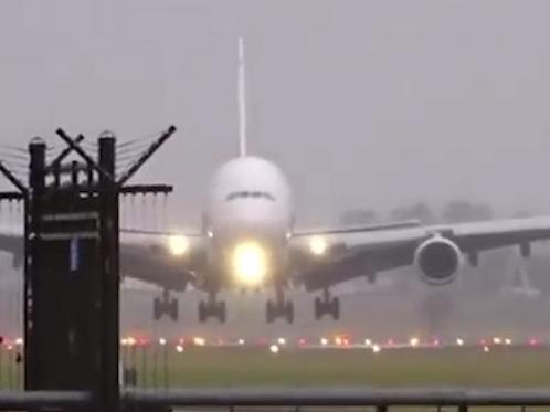 Picture: YouTube THE world’s largest passenger plane was rocked violently by strong winds as another jet bounced off the tarmac whilst descending onto a runway in a ferocious storm. The Emirates Airbus A380 was almost forced to land sideways and a Swiss International Air Lines pilot had to abort landing as they arrived at Amsterdam’s Schipol Airport.