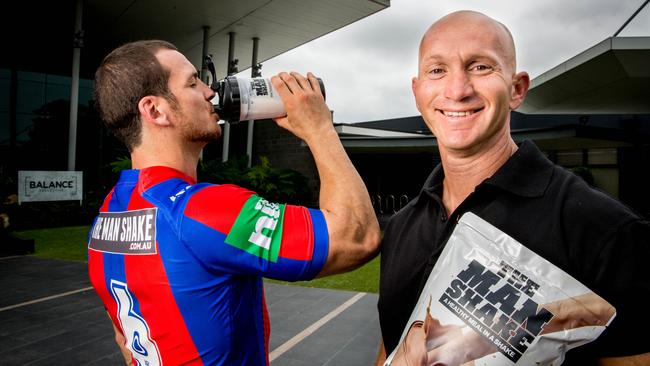 Newcastle Knights captain Jarrod Mullen with a new sponsor The Man Shake owner Adam McDougall at Knights headquarters in Mayfield, 26th February 2016. Picture: Ryan Osland