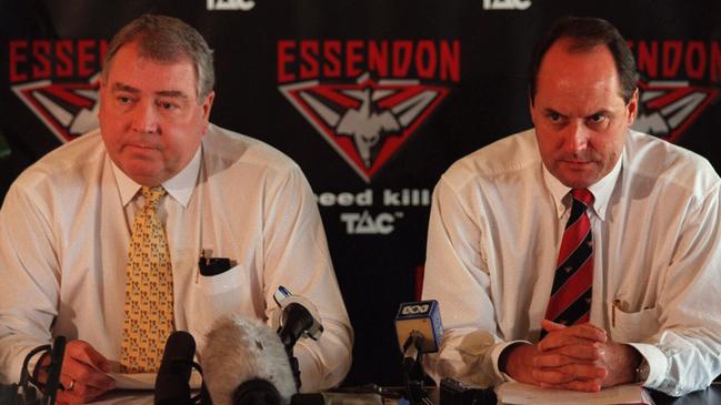 Essendon chairman Graeme McMahon and chief executive Peter Jackson at a press conference in 1999 after the Bombers were fined for salary cap breaches between 1992 and 1996.