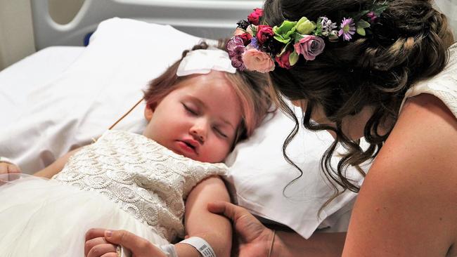 Paige Skarratts with mum Tania prior to her parents’ impromptu wedding at Lady Cliento Children’s Hospital in Brisbane.