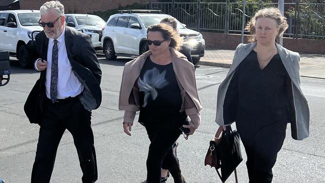 Rosemary Gamble (middle) leaving the Devonport Magistrates Court. Picture: Simon McGuire.