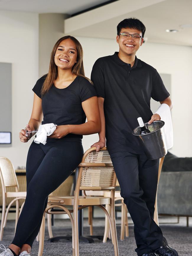 Western Sydney teens Tashana Opelu (left) and Joshua Sabaten have taken up hospo jobs at Commbank Stadium in Parramatta. Picture: Sam Ruttyn