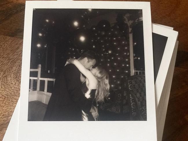 Kylie Minogue kisses a new beau on her 50th birthday.