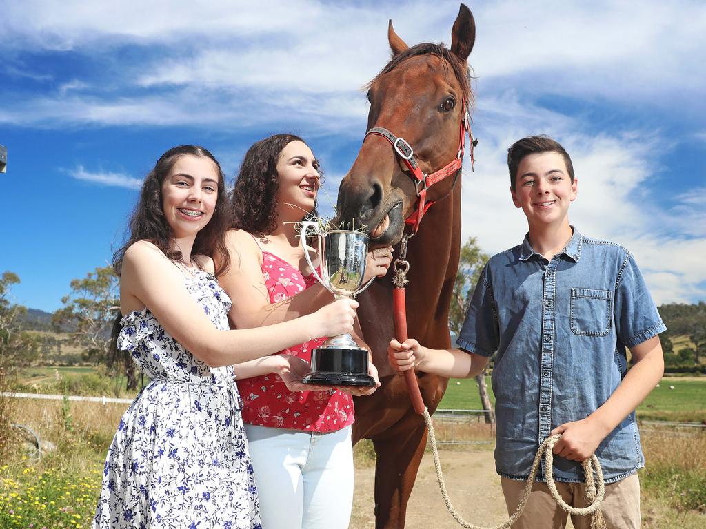 Hugo, trained by Brendan McShane, with Brendan’s children Lily, 14, left, Lucy, 17, and Harry, 15, ahead of the Devonport Cup. Picture: LUKE BOWDEN