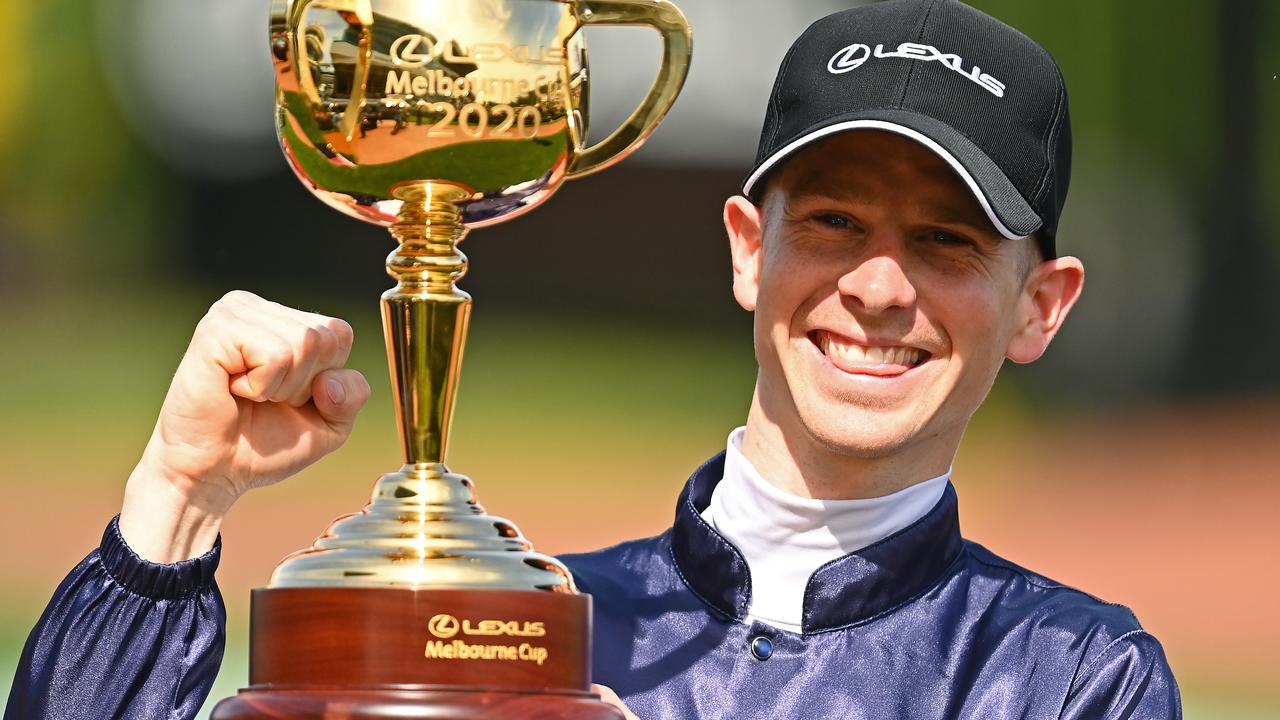 Winning jockey Jye McNeil with the Melbourne Cup trophy. Picture: Getty Images