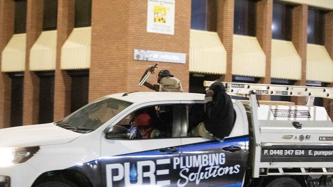 Youths in Alice Springs drive a stolen Toyota Hilux through town at 4am earlier this year. Picture: Liam Mendes/The Australian