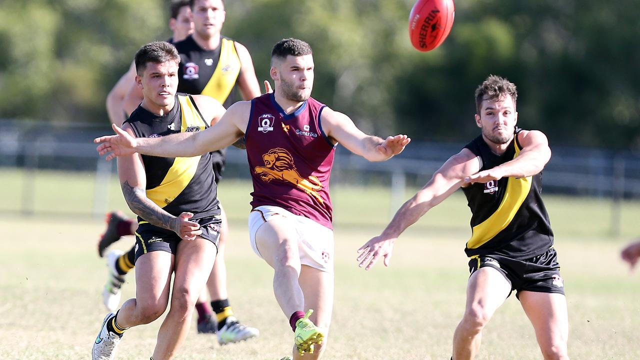 Round 14 of the QAFL. Labrador vs. Palm Beach Currumbin at Labrador. Photo of Tyler Cornish kicking a goal. Photo by Richard Gosling