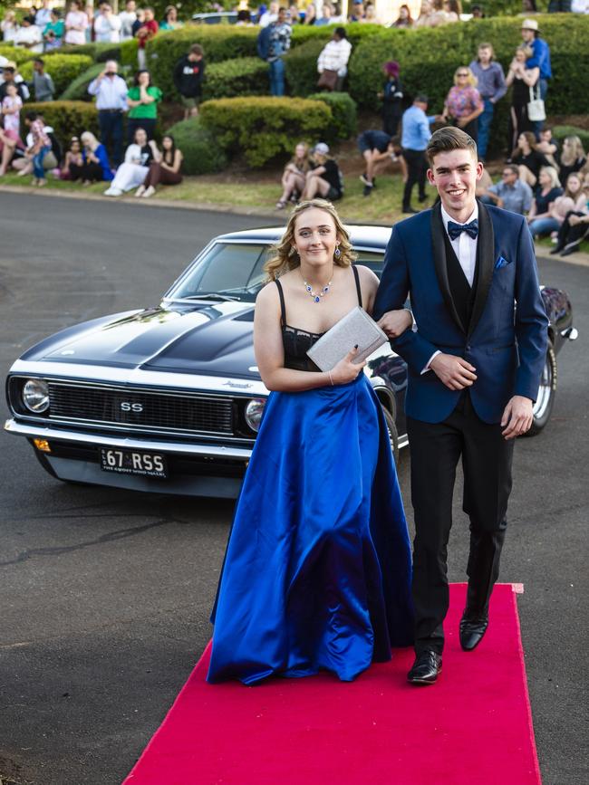 Natania Horrocks and Ethan Dwyer arrive at Harristown State High School formal at Highfields Cultural Centre, Friday, November 18, 2022. Picture: Kevin Farmer