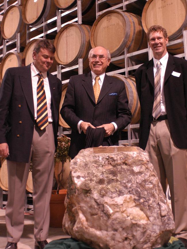 AGEING WELL: Former Prime Minister John Howard (c) with winemaker David O'Leary (l) and Nick Walker (r) at opening of O'Leary Walker Wines in 2003