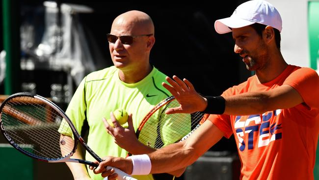 With Novak Djokovic at Roland Garros in 2017. Picture: AFP/ Christophe Simon