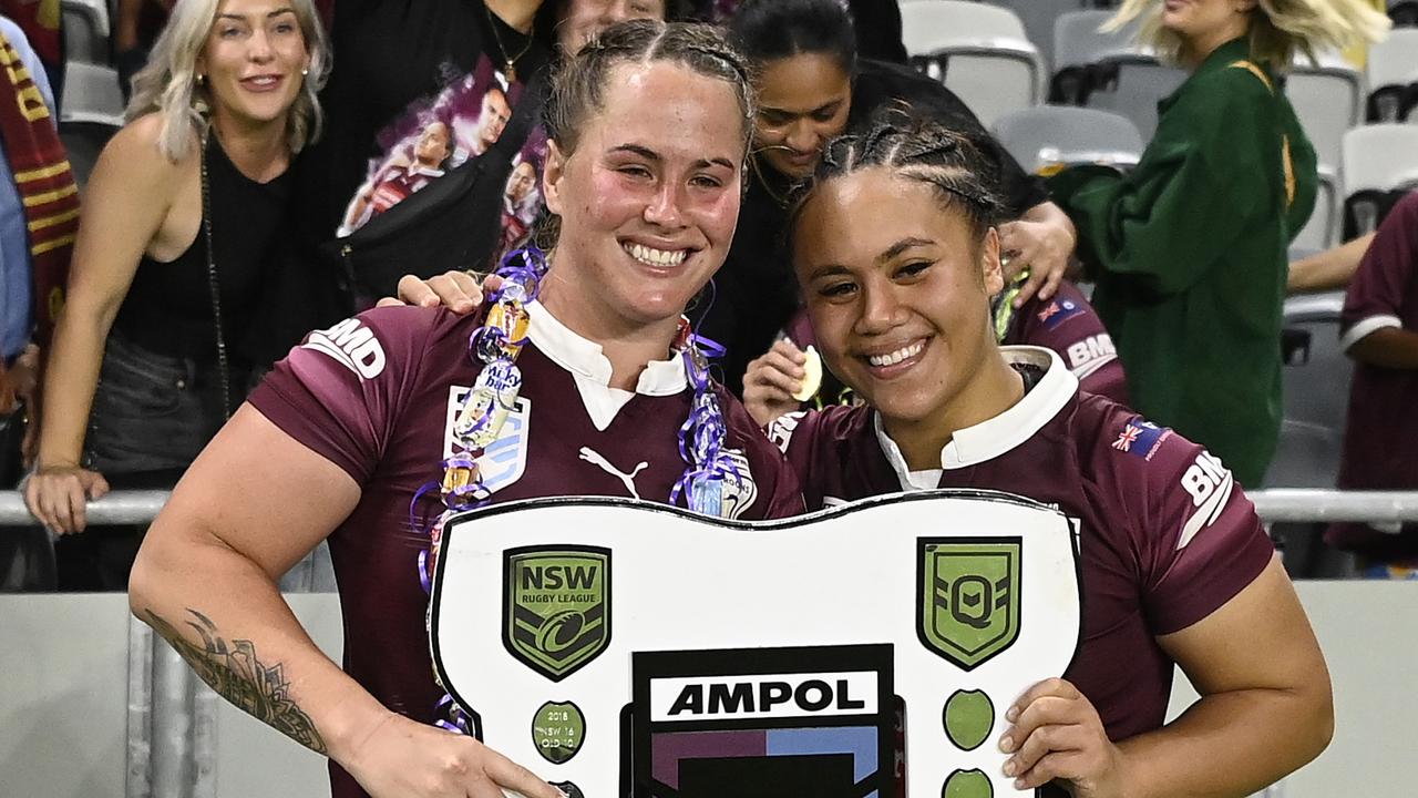 Two Logan girls - Keilee Joseph and Destiny Brill of the Maroons celebrate after winning the State of Origin series. (Photo by Ian Hitchcock/Getty Images)