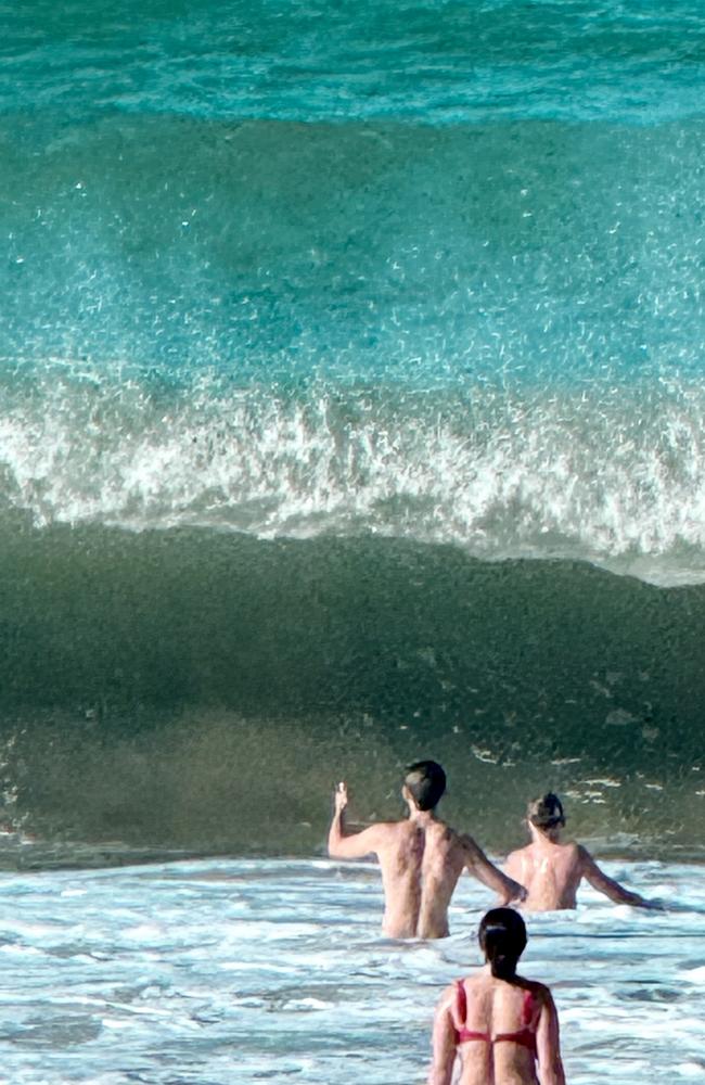 Board riders were being crunched in the big swell at Mooloolaba late Thursday afternoon as Tropical Cyclone Alfred hovered off the Qld coastline. Photo: Mark Furler