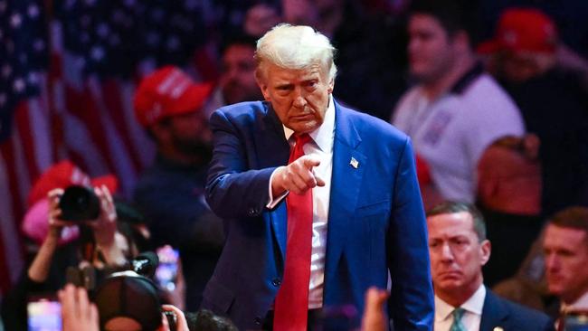 TOPSHOT - Former US President and Republican presidential candidate Donald Trump leaves a campaign rally at Madison Square Garden in New York, October 27, 2024. (Photo by ANGELA WEISS / AFP)