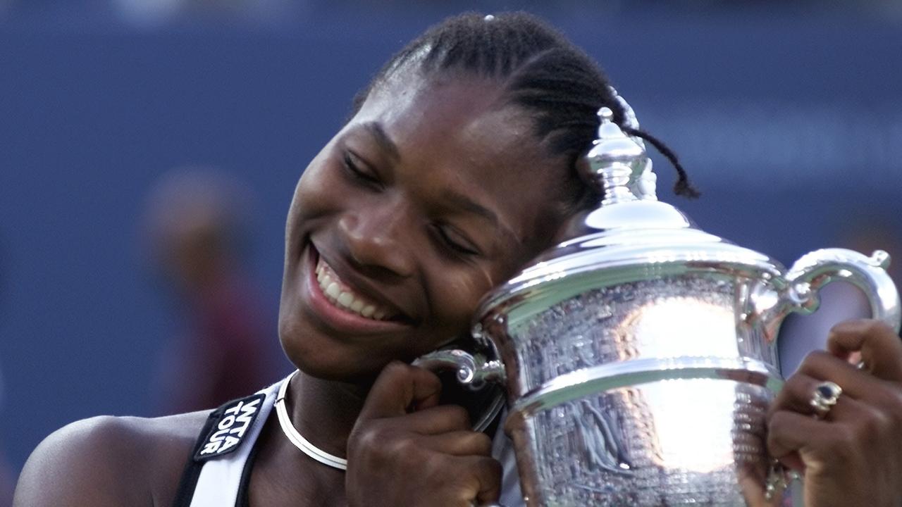 Serena Williams with her first ever women's singles championship trophy after defeating Martina Hingis at the US Open in NY Sept. 11, 1999 Picture: AP Photo