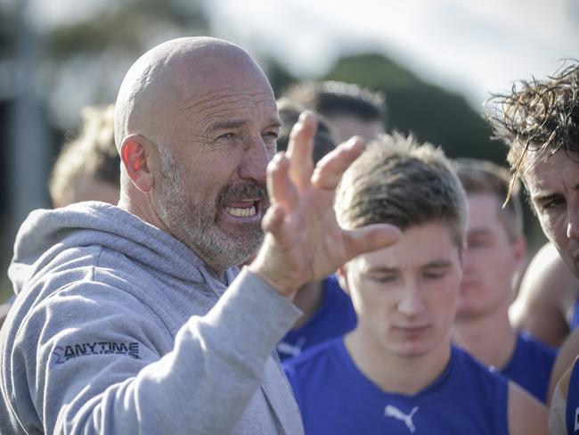 Mornington coach Simon Goosey works the huddle.