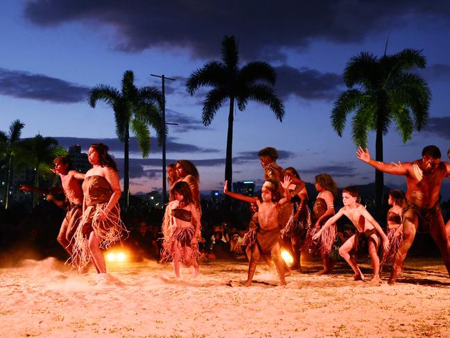 The Kuku Yalanji dance group perform to a large crowd at the Calling Country Ceremony, the opening event of the Shine On Gimuy indigenous cultural festival, held on the Cairns Esplanade Eastern Events lawn on Thursday night. Picture: Brendan Radke