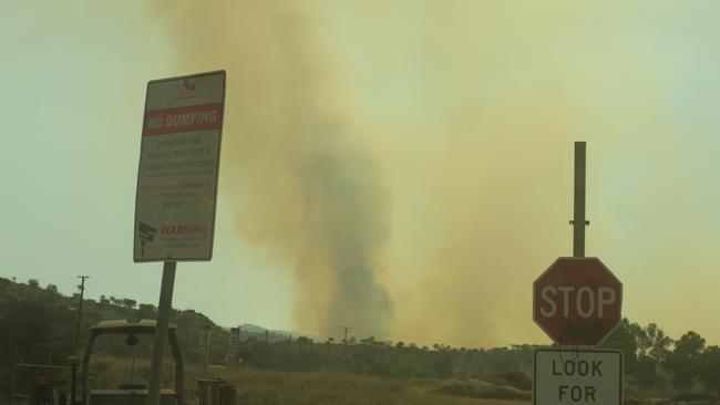 Alice Springs residents woke to ash and smog over the weekend as the blaze surrounded the town. Picture: Laura Hooper.