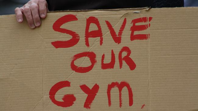 A sign at a mini rally of Mortlake gym-goers on June 18. Picture: Alexi Demetriadi