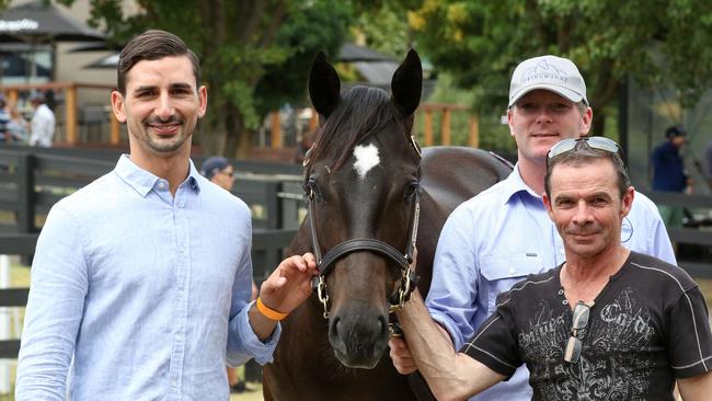 Gold Coast trainer Michael Costa (left) with Brazen Beau colt and Paul Knight from Orbis Bloodstock. Picture: SUPPLIED