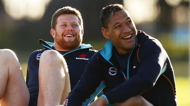 SYDNEY, AUSTRALIA - JULY 08: Paddy Ryan (L) and Israel Folau (R) watch on from the sideline during a Waratahs Super Rugby training session at Kippax Lake on July 8, 2014 in Sydney, Australia. (Photo by Matt King/Getty Images)