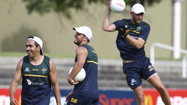 Jack Gunston (right) joins Eddie Betts and Travis Boak for international rules training. Picture: Sarah Reed