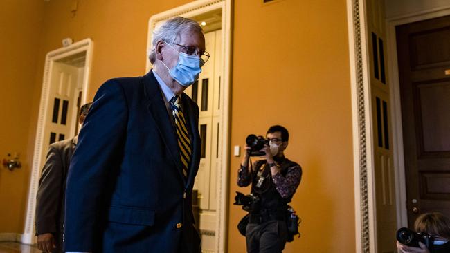 Senate Minority Leader Mitch McConnell heads back to his office after calling the Senate into session. Picture: Getty Images