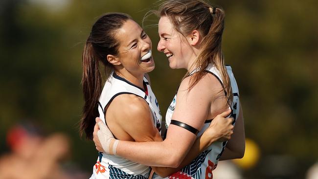 Sophie Li (left) and Ailish Considine celebrate their side’s dominant victory. Picture: Michael Wilson. 