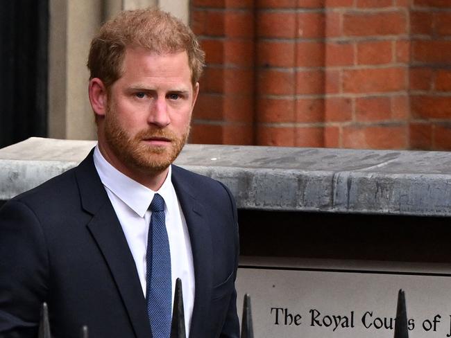 (FILES) Britain's Prince Harry, Duke of Sussex leaves from the Royal Courts of Justice, Britain's High Court, in central London on March 27, 2023. Lawyers for Prince Harry on December 5 began a legal challenge over his security arrangements in the UK, after he quit frontline royal duties and moved to North America.  The case about his loss of UK taxpayer-funded protection is the latest in a string of court proceedings initiated by Harry, whose father is King Charles III. (Photo by JUSTIN TALLIS / AFP)