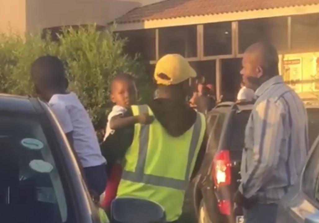 Video from Florida, Gauteng, South Africa, shows the aftermath of what local resident Siyabulela Precious Ruiters calls “irresponsible” parenting. Parked outside a local Spar convenience store, Ruiters filmed a security guard holding a toddler, while another small child plays in an open window in a nearby car. Ruiters explains in a commentary accompanying the video that the back window of the car was left “wide open,” with the children “alone” inside. One of the children, who she says is a girl who is “almost two,” began to cry leading to the security guard’s intervention. Ruiters said that after filming the video she “waited in my car for like 15 min” and there was still no sign of any adult coming back to claim the children as theirs. “Parent – no show,” she added. A man who commented on the video claiming to be the security guard involved, Piroger Mabeka, wrote, “It is never alright to leave a child in a car for any amount of time. Anything could happen, the child could become ill or the car could be hijacked with the child inside. There is no reason for a parent to leave their child locked up in a car these days because malls have trolleys and carts that you can carry your children around in while you shop. There is just no excuse.” He added in a further comment, “dear parent dont do this , bcoz [sic] if s.thing bad happen u gonna blame the carguard for nothing but i just tried my part as a car guard and much appreciated the person who took the video.” The footage had just under 8,000 views at time of writing. Credit: Siyabulela Precious Ruiters via Storyful