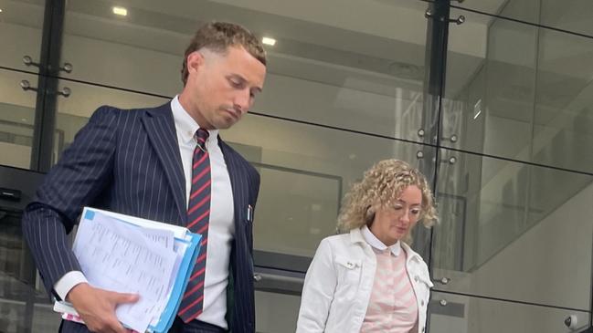 Karly Rae leaving Newcastle Local Court with her lawyer James Janke. Picture: NewsLocal