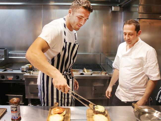 The footy star serves up a treat at Westfield Eastgardens. Picture: Daniel Aarons