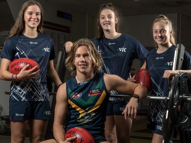 Maribyrnong College has 15 students that made the AFL state representative teams. Some of these footballers Ellie McKenzie, Jasmine Goodman and Jess Fitzgerald (all U/15 Vic Girls team) and Jack Bytel the NAB AFL Academy Rep U/18 Vic Metro are pictured at school on Monday 19th June, 2017. Picture: Mark Dadswell