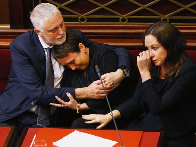 MELBOURNE, AUSTRALIA - NOVEMBER 02: Labor MP Jaala Pulford is hugged by Gavin Jennings MP while crying after speaking about the loss of her daughter on November 2, 2017 in Melbourne, Australia. Victoria's lower house passed the historic voluntary euthanasia laws on Friday 20 October after 26 hours of debate. Victoria will be the first state in Australia to offer an assisted dying regime if the legislation is passed by the upper house.  (Photo by Michael Dodge/Getty Images)