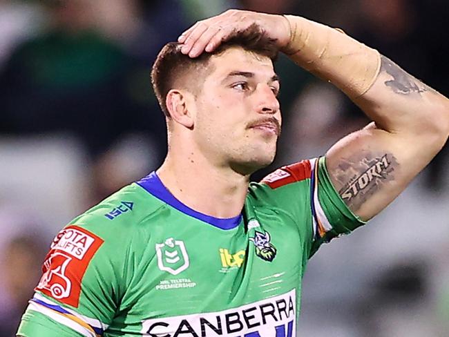 CANBERRA, AUSTRALIA - MAY 22:  Corey Harawira-Naera and Curtis Scott of the Raiders look dejected after defeat during the round 11 NRL match between the Canberra Raiders and the Melbourne Storm at GIO Stadium, on May 22, 2021, in Canberra, Australia. (Photo by Mark Kolbe/Getty Images)