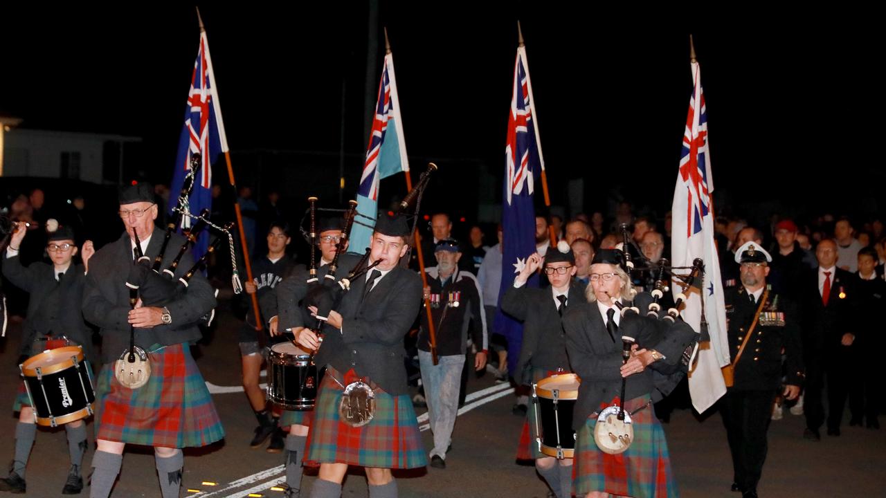 War veterans and descenants march towards Pinegrove Memorial Park in Minchinbury for the start of the Anzac Day dawn service. Picture: Angelo Velardo