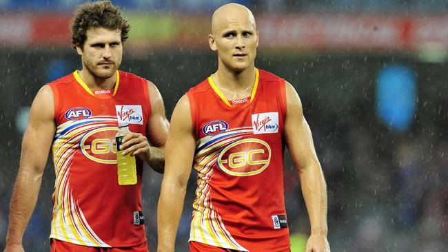 Former Gold Coast teammates Campbell Brown and Gary Ablett.