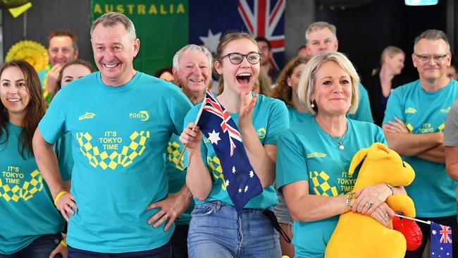 Steve and Robyn with daughter Mia watch the ceremony. Picture: Patrick Woods