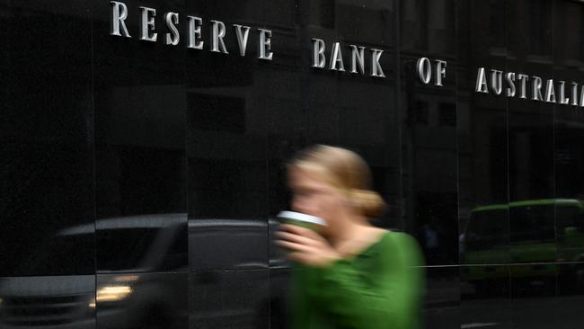 A pedestrian walks past the Reserve Bank of Australia (RBA) building in Sydney, Tuesday, March 3, 2020. The Reserve Bank is expected to cut the cash rate to a new record low 0.5 per cent on Tuesday. (AAP Image/Joel Carrett) NO ARCHIVING