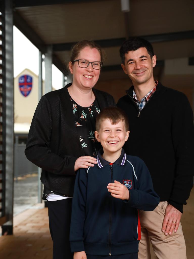 Samuel Wright, 9, with proud parents Naomi and Jason, has never been to Canberra before and hopes to share the experience with his two brothers. Picture: Philip Gostelow