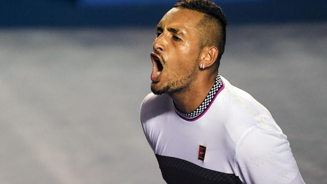 Nick Kyrgios celebrates his comeback victory.