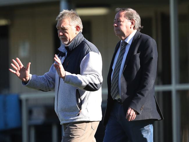 Eels directors Geoff Gerard and Paul Garard leave after NRL CEO Todd Greenberg addressed the Eels players on the day of the announcement about the club’s salary cap breaches. Picture: Phil Hillyard