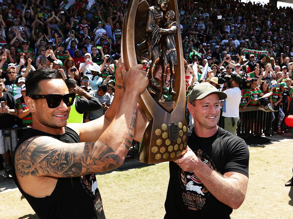 John Sutton and coach Michael Maguire celebrating the 2014 NRL Premiership. Pic Brett Costello