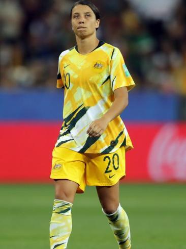 Sam Kerr reacts to missing her penalty