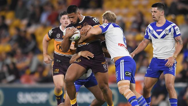 BRISBANE, AUSTRALIA - JULY 11: Payne Haas of the Broncos is tackled during the round nine NRL match between the Brisbane Broncos and the Canterbury Bulldogs at Suncorp Stadium on July 11, 2020 in Brisbane, Australia. (Photo by Albert Perez/Getty Images)