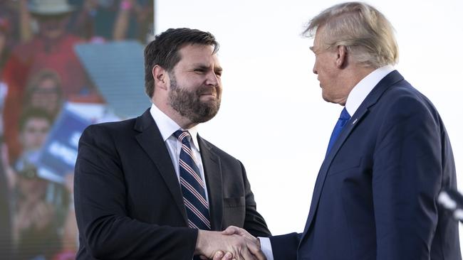 J.D. Vance shakes hands with former President Donald Trump during a rally hosted by the former president in Delaware, Ohio in 2022. Picture: Drew Angerer/Getty Images/AFP