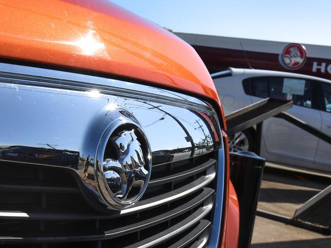 A Holden vehicle sits in a car yard in Melbourne on February 17, 2020. - General Motors announced on February 17 it would scrap struggling Australian car brand Holden, with engineering, design and sales operations to be wound down in the coming months. (Photo by William WEST / AFP)